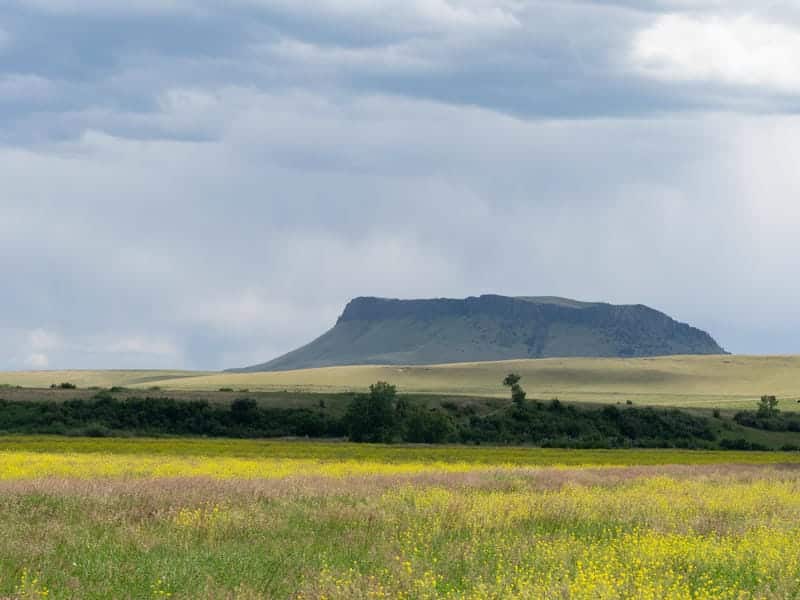 Montana ranch landscape with mountains